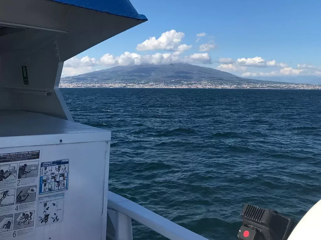 View of Mount Vesuvius from a ferry in the Bay of Naples