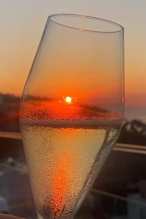 The sunset viewed through a glass of wine at Terrazza Vittoria, Hotel Continental in Sorrento