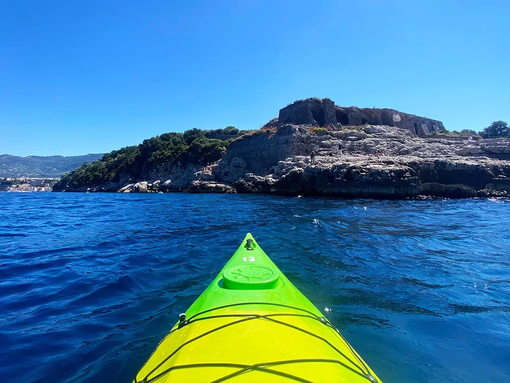 kayak in sea with bagno della giovanna regina beyond sorrento