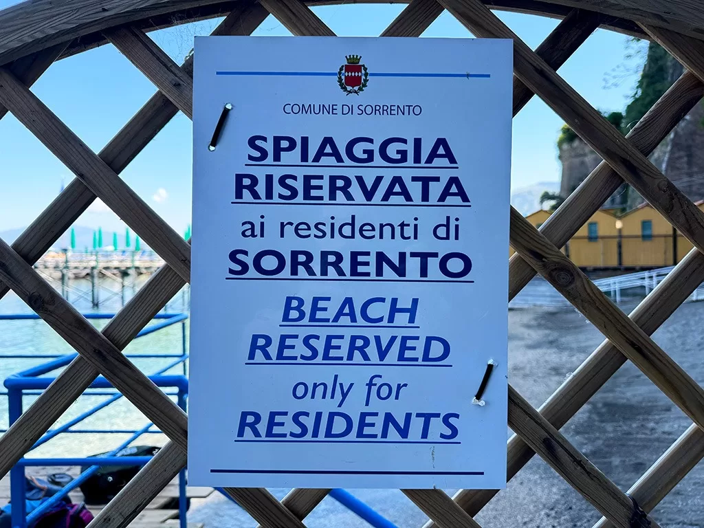 beach signs in sorrento saying beach reserved for residents only