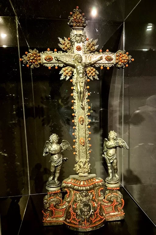 ornate catholic cross in treasures of san gennaro museum