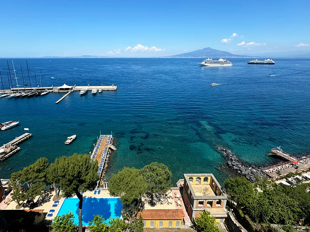 view of beach clubs in sorrento from town