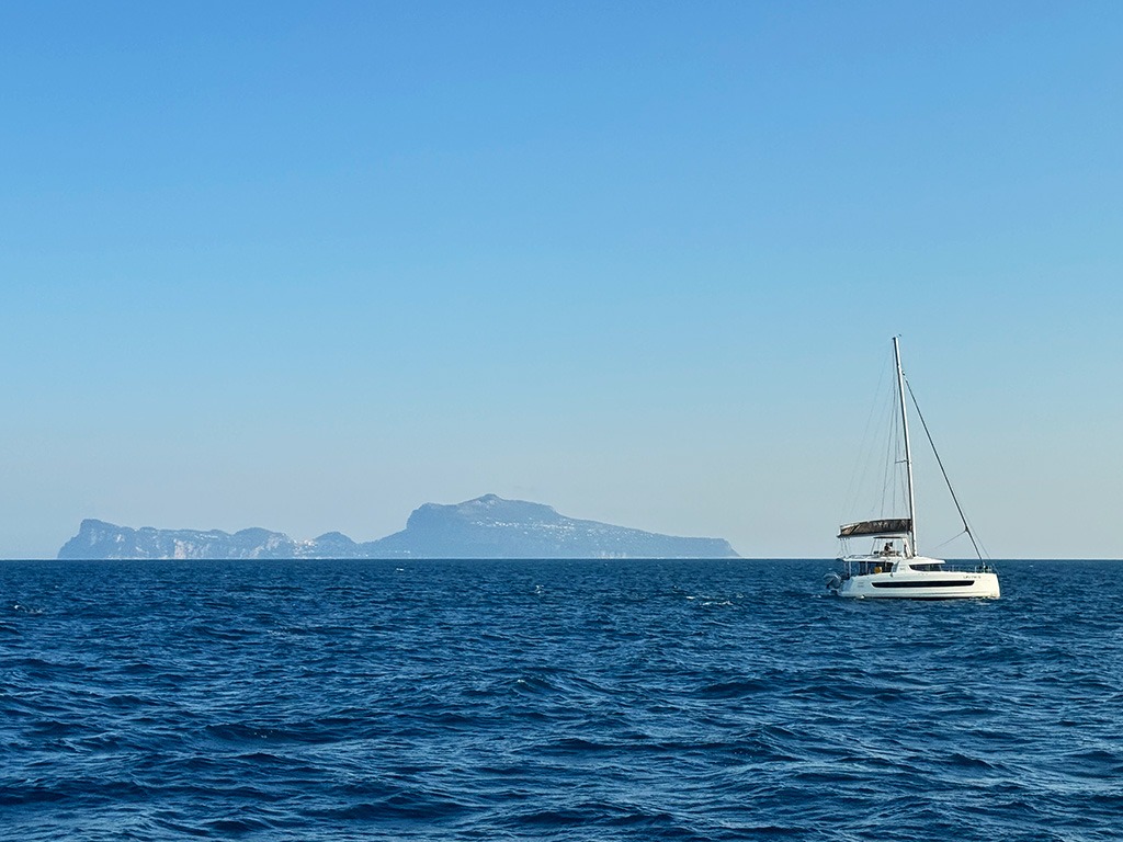 view of capri from ferry between ischia and sorrento