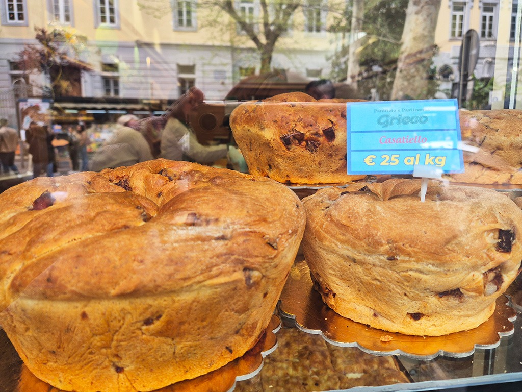 casatiello neapolitan breads on display in bakery window