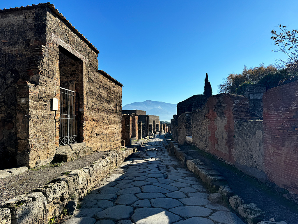 long view of ancient street in pompeii