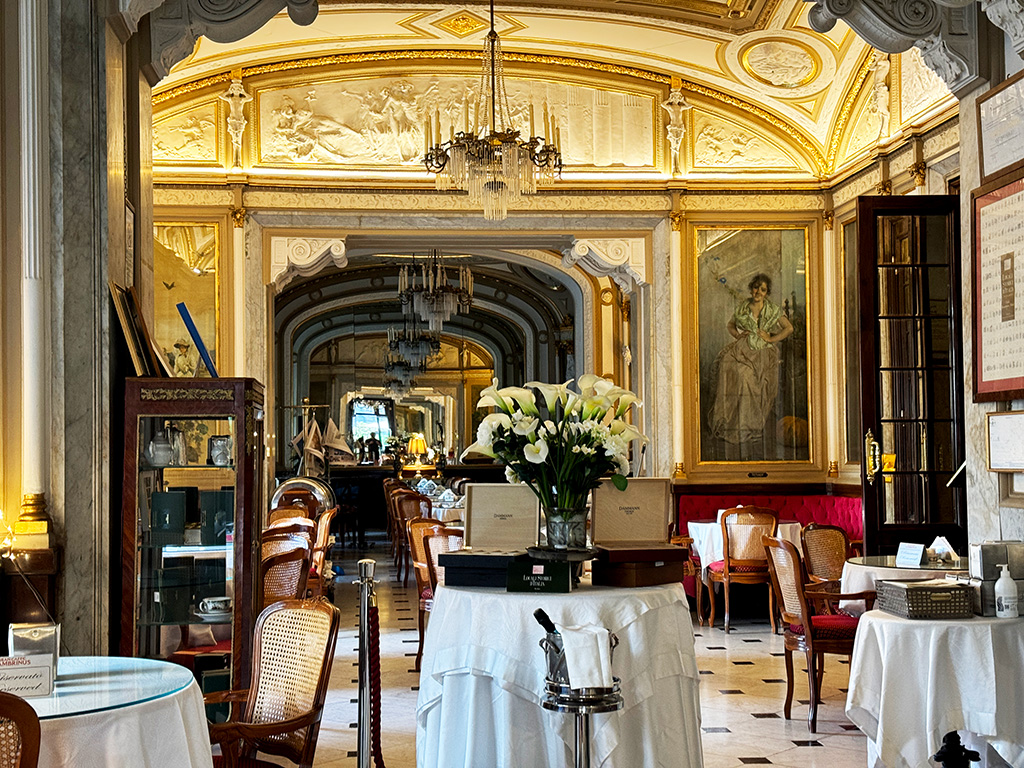 gran caffee gambrinus interior tables and chairs